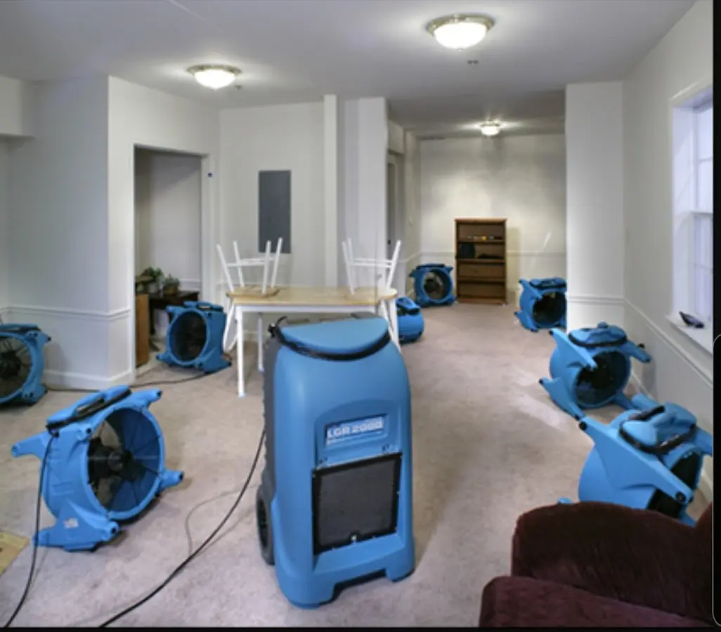 Air movers and dehumidifier setup for Water Damage Restoration in Anna